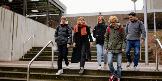 Students walking across campus.